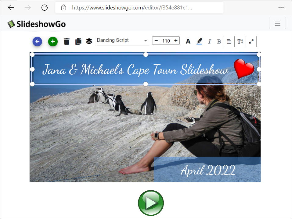 woman sitting on sandy ledge with penguins