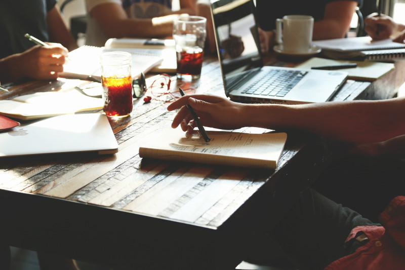 picture of people meeting at a table